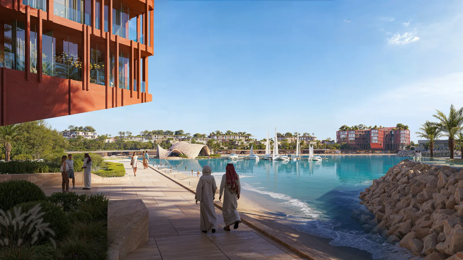 Visitors walking the promenade beside the yacht berths, the shell-roofed pavilion across the water